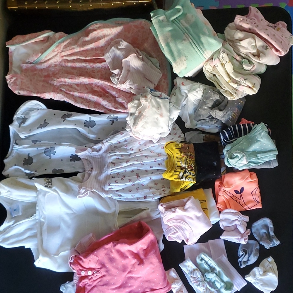 Bundle of girl newborn clothes